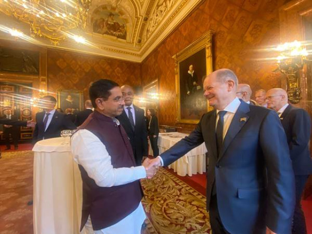 Union Minister of New and Renewable Energy Shri Pralhad Joshi interacts with Chancellor of Germany Mr. Olaf Scholz  -yojXjrAx8x.jpg